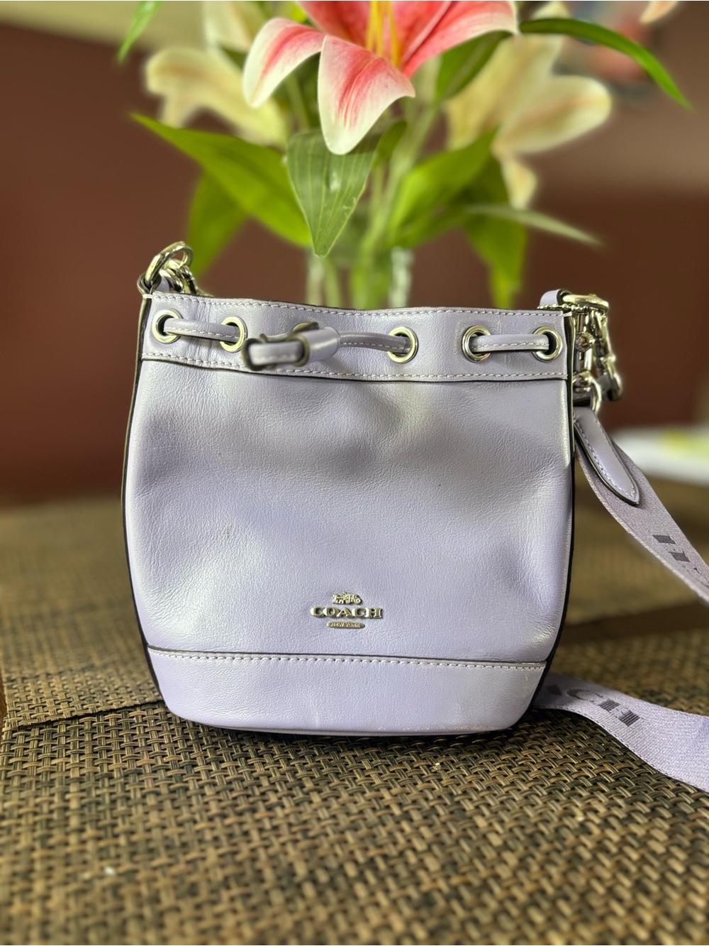 Coach Lilac Pebble Leather Drawstring Crossbody Bag